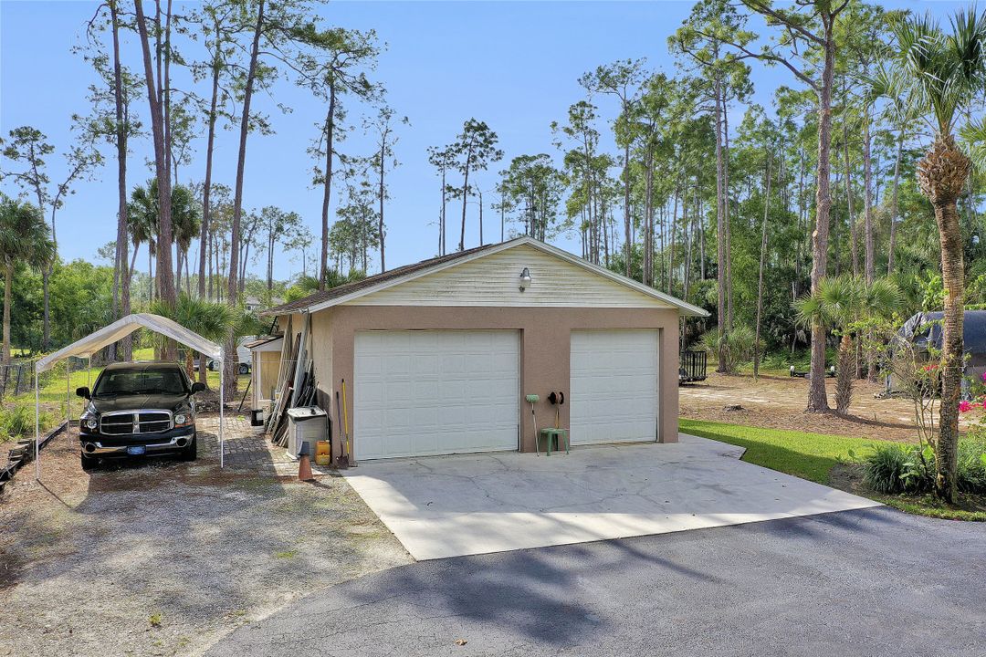 5980 Hidden Oaks Ln, Naples, FL 34119