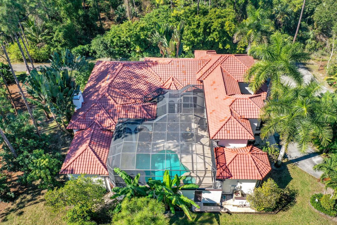 4930 Mahogany Ridge Dr, Naples, FL 34119