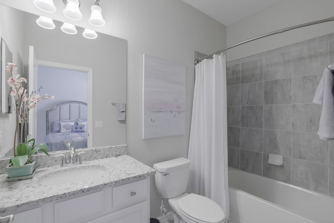 1493 Artesia Dr W, Naples, FL 34113