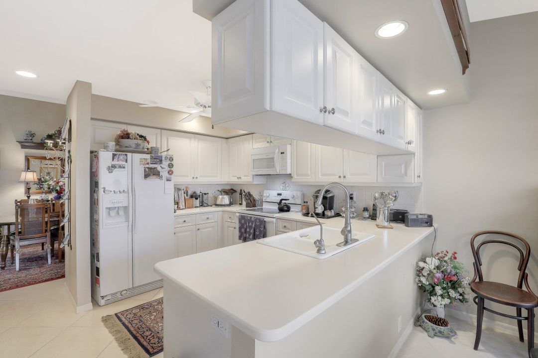 11592 Quail Village Way, Naples, FL 34119