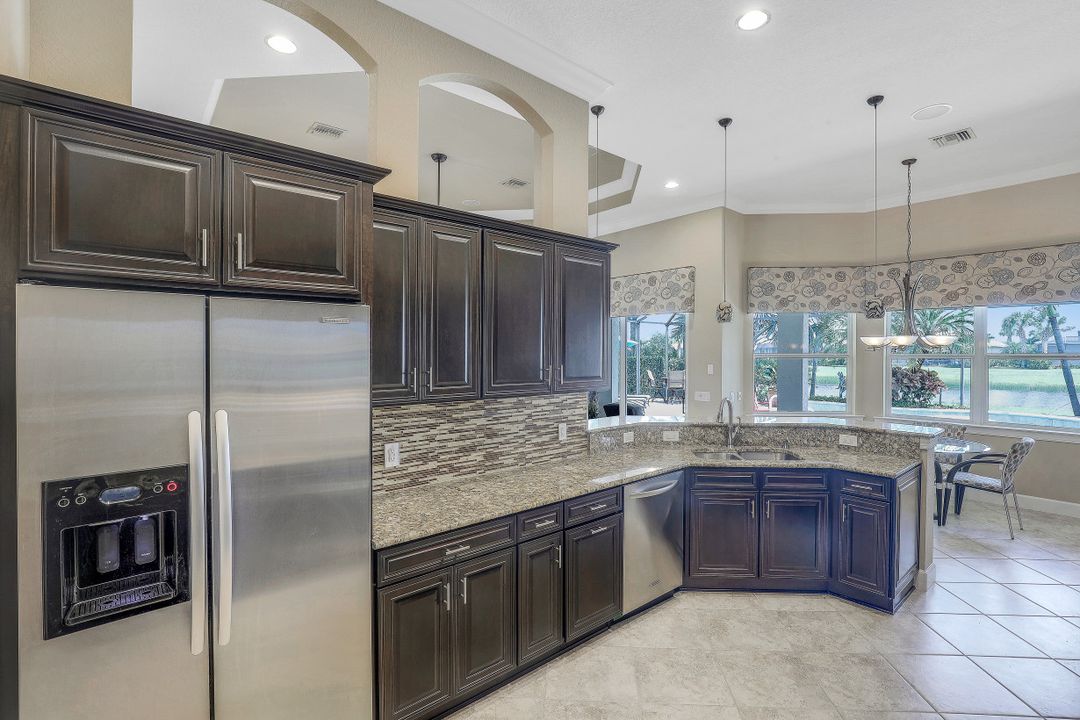 9403 Copper Rock Ct, Naples, FL 34120