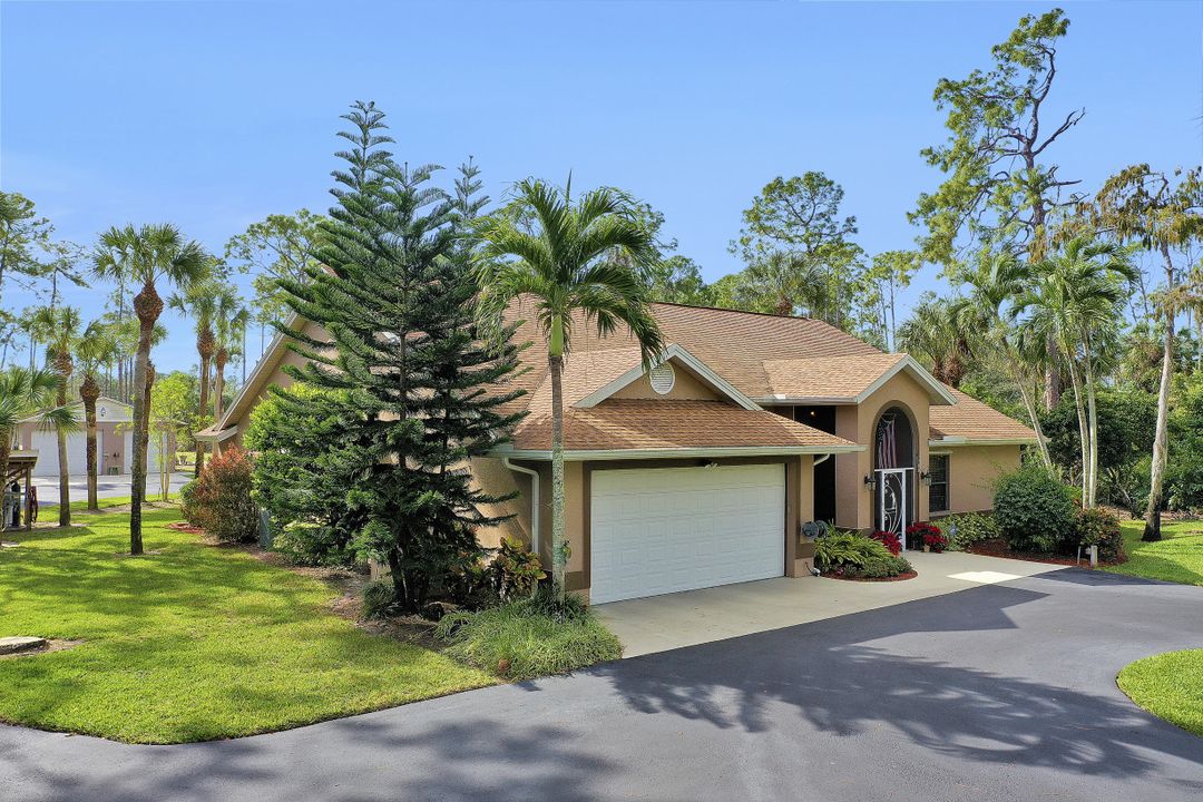 5980 Hidden Oaks Ln, Naples, FL 34119