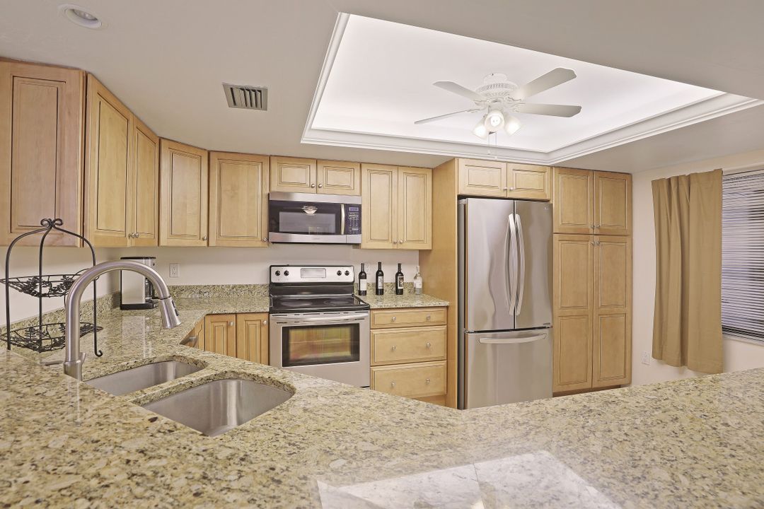 571 Beachwalk Cir #104, Naples, FL 34108