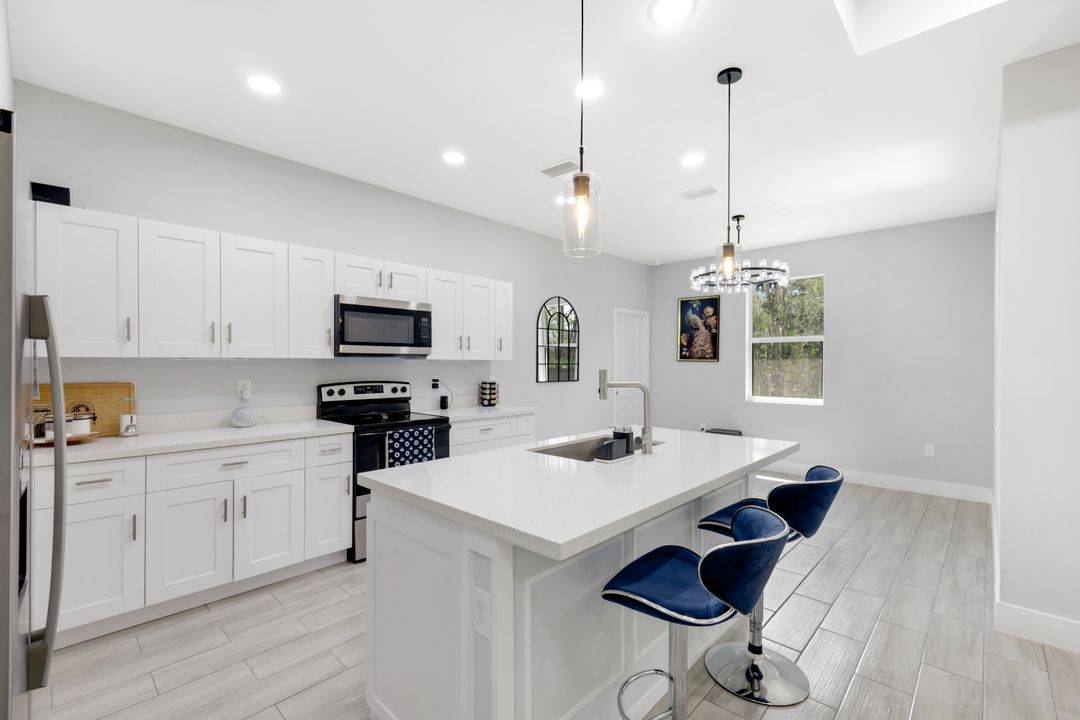 506 Rogue St, Lehigh Acres, FL 33974