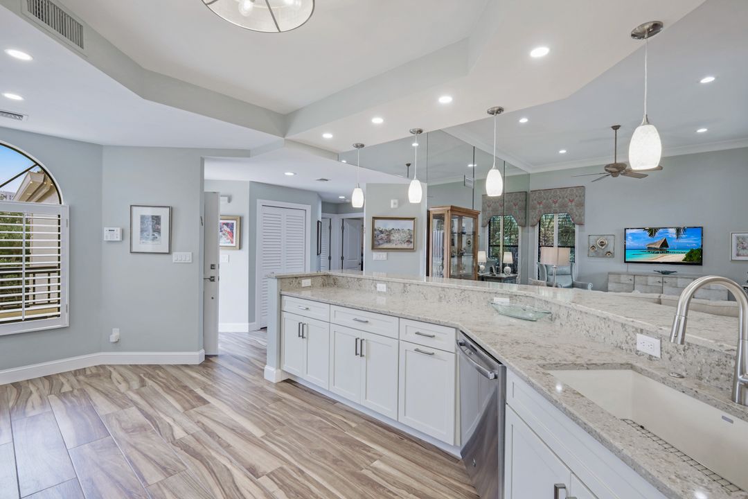 7048 Pelican Bay Blvd #305, Naples, FL 34108