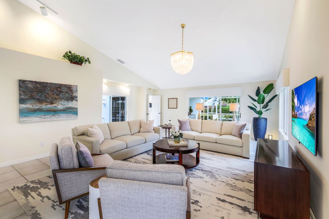 703 Heathery Ln, Naples, FL 34108