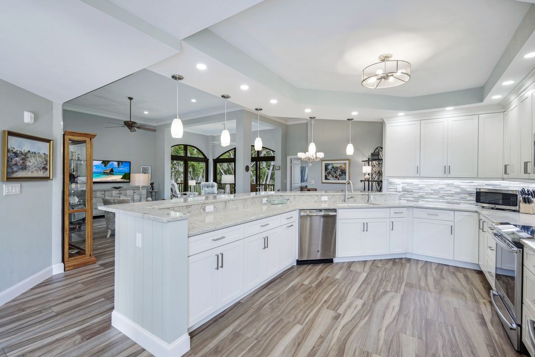 7048 Pelican Bay Blvd #305, Naples, FL 34108