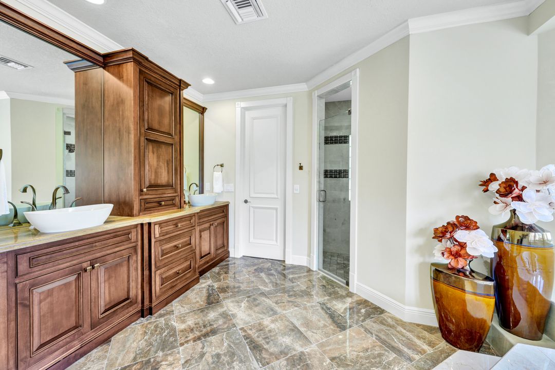 13488 Pond Apple Dr W, Naples, FL 34119