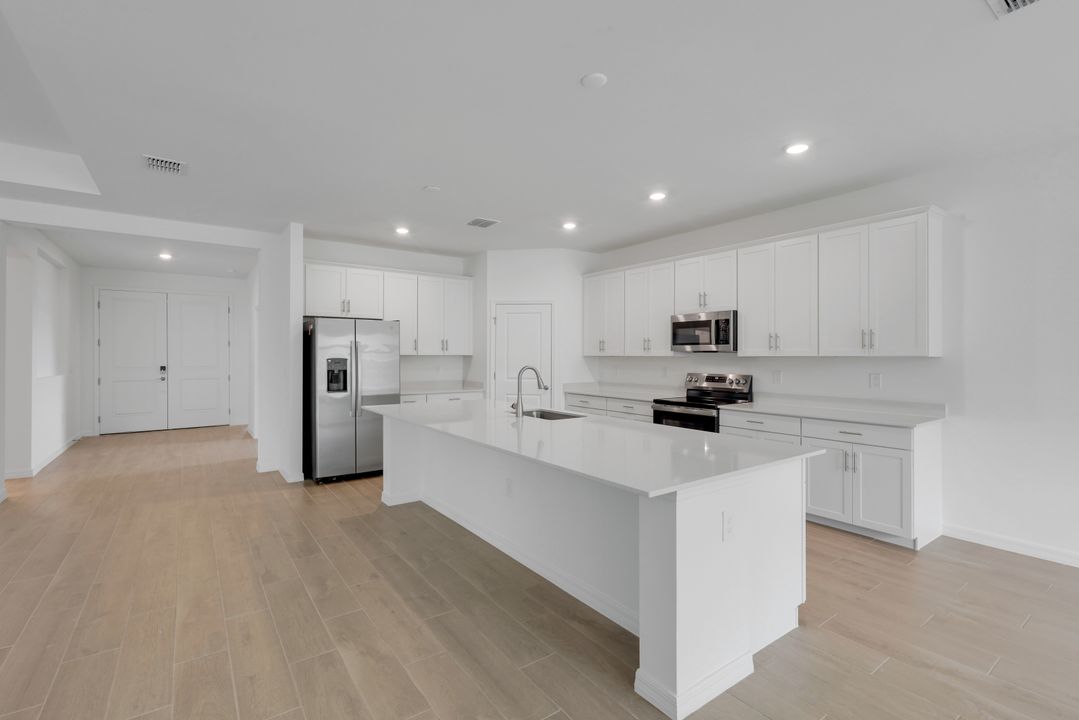 5180 Sugarwood Drive, Naples, FL 34112