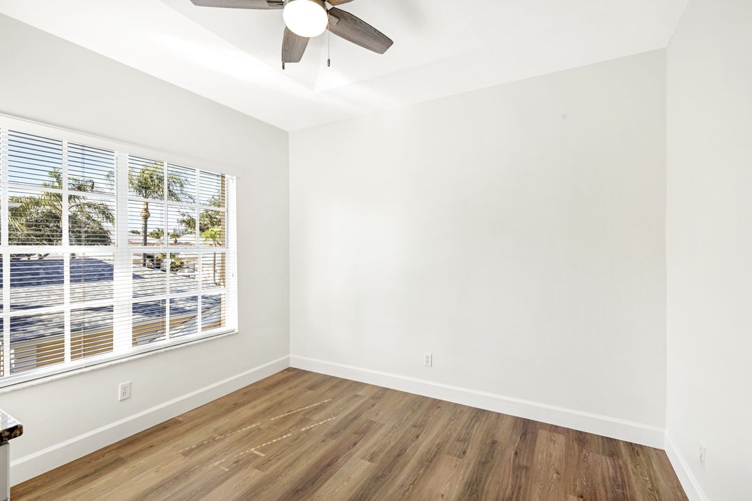 675 Wiggins Lake Dr #202, Naples, FL 34110