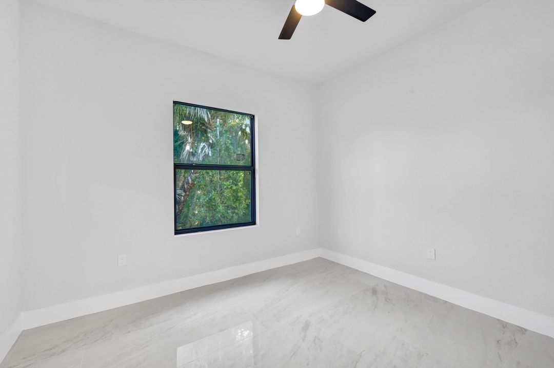 1222 Hilliard St E, Lehigh Acres, FL 33974