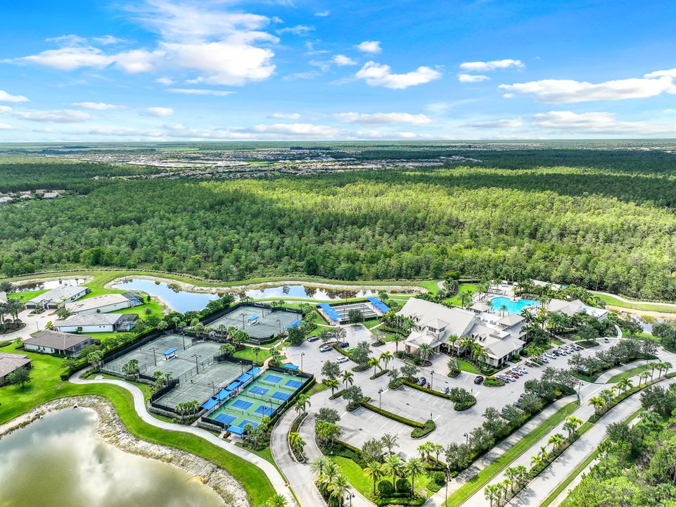 7408 Winding Cypress Dr, Naples, FL 34114