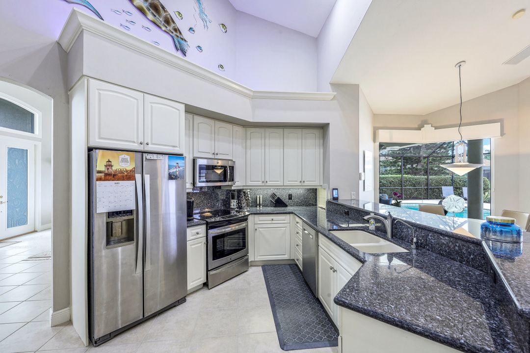 7092 Peach Blossom Ct, Naples, FL 34113