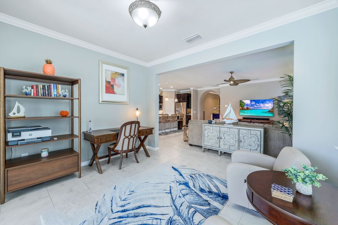 7408 Winding Cypress Dr, Naples, FL 34114