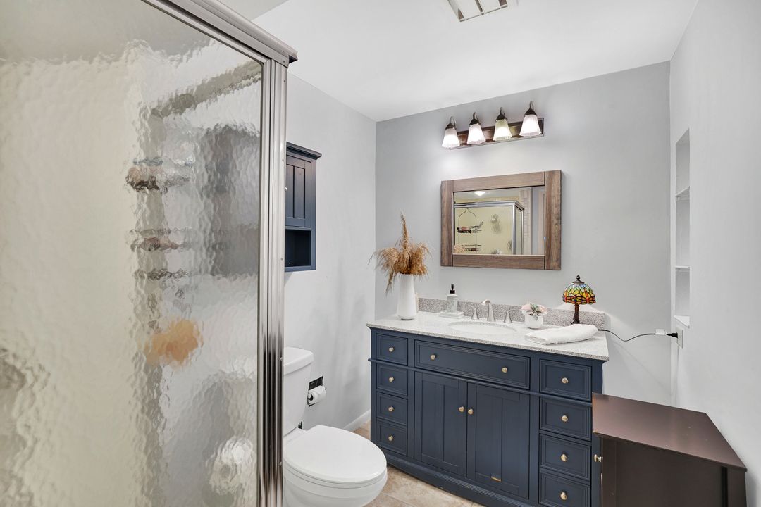 208 Baltusrol Dr, Naples, FL 34113