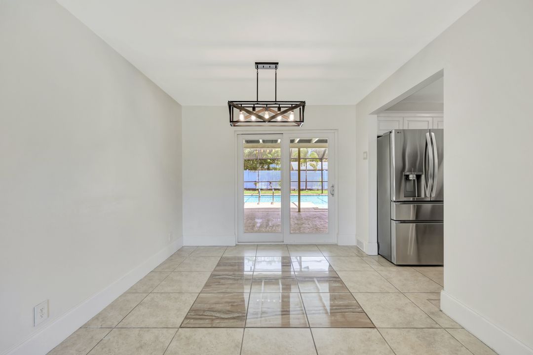 124 Flame Vine Dr, Naples, FL 34110