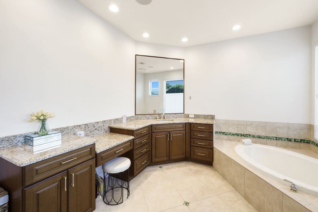 12924 Bald Cypress Ln, Naples, FL 34119