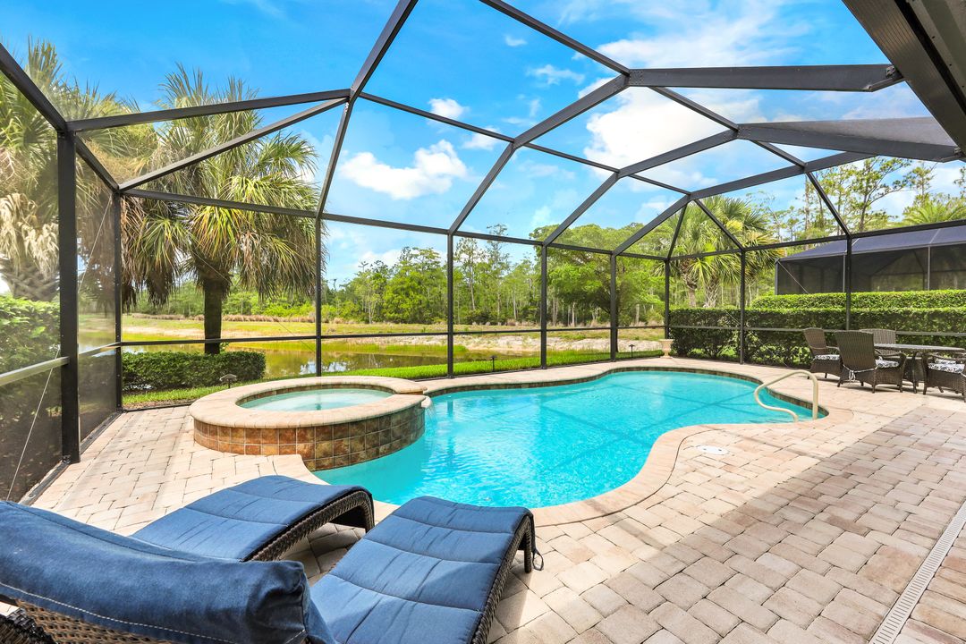 7408 Winding Cypress Dr, Naples, FL 34114