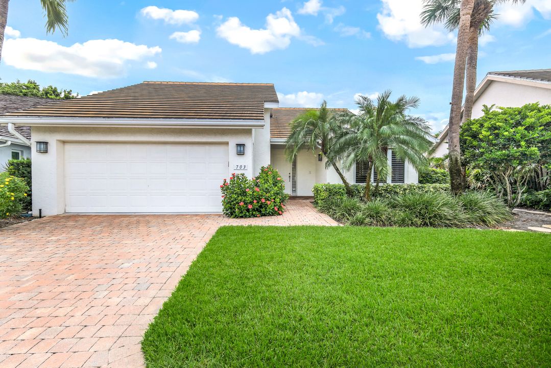 703 Heathery Ln, Naples, FL 34108