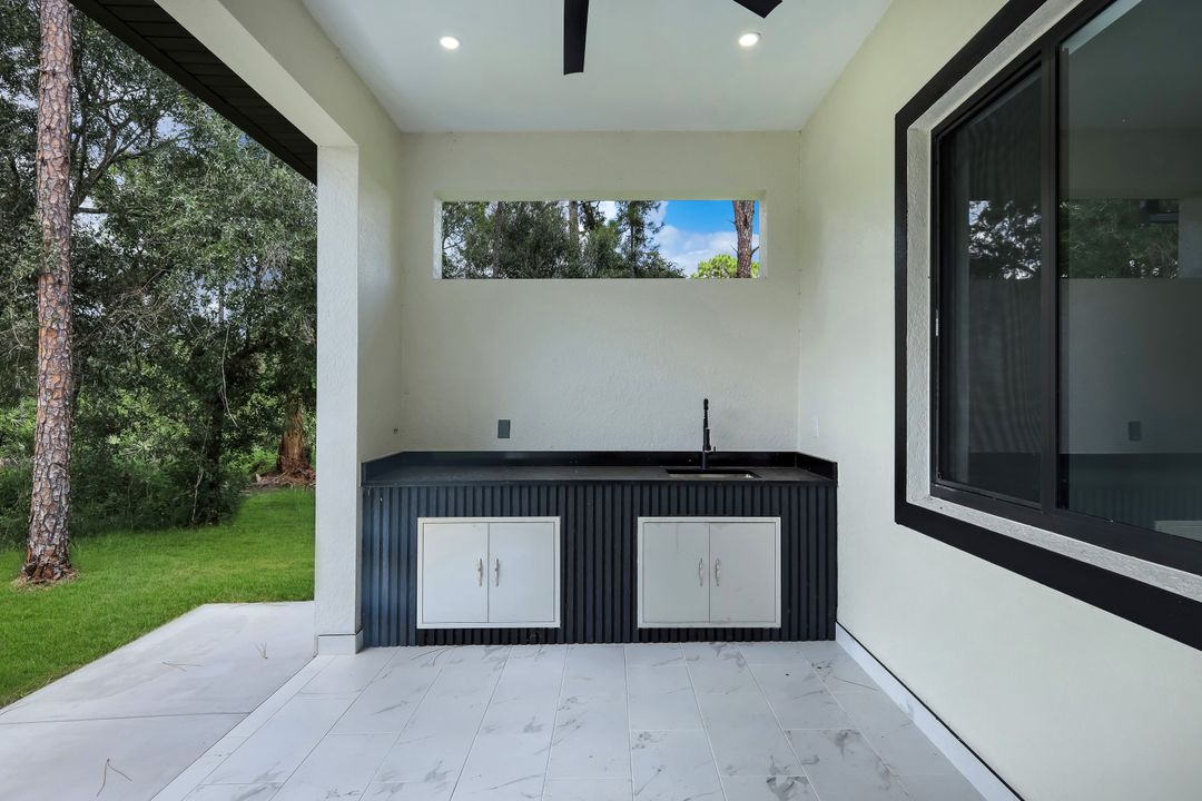 1207 Ramus St E, Lehigh Acres, FL 33974