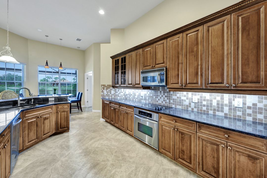 11921 Heather Woods Ct, Naples, FL 34120