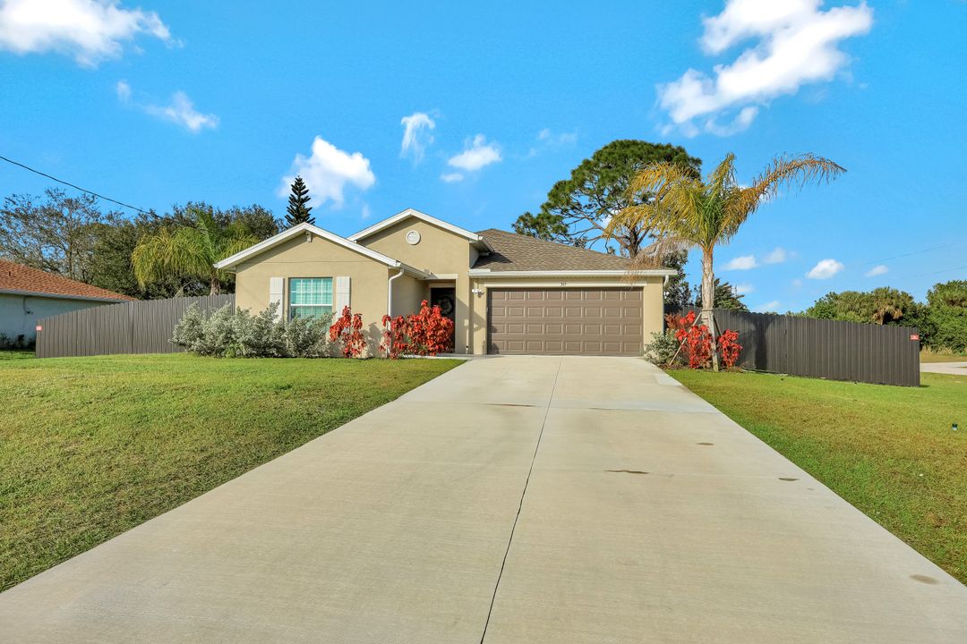 365 Partridge St, Lehigh Acres, FL 33974