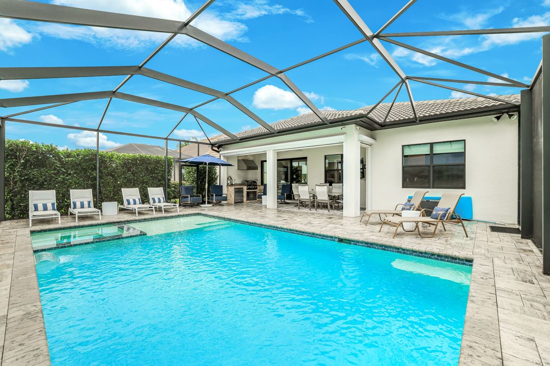 7631 Winding Cypress Dr, Naples, FL 34114