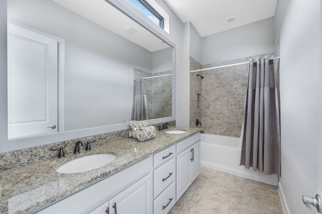 8678 Amour Ct, Naples, FL 34119