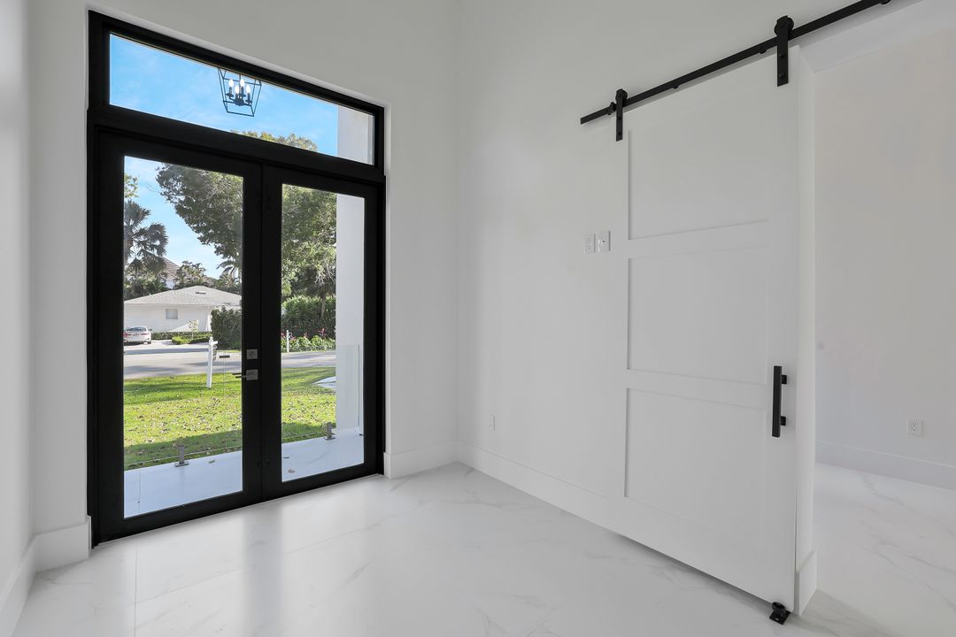 1317 Cypress Woods Dr, Naples, FL 34103