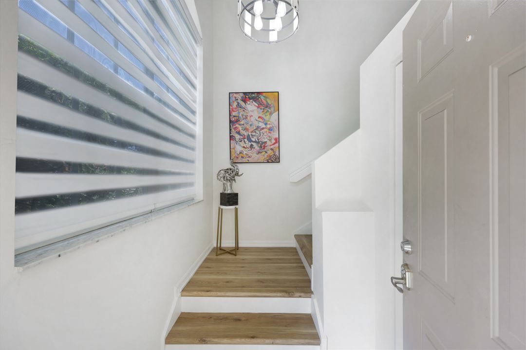 7518 Silver Trumpet Ln #201, Naples, FL 34109