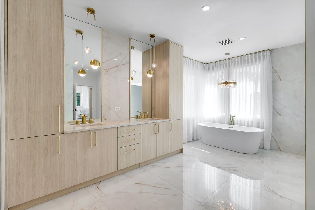 13087 Pond Apple Dr E, Naples, FL 34119