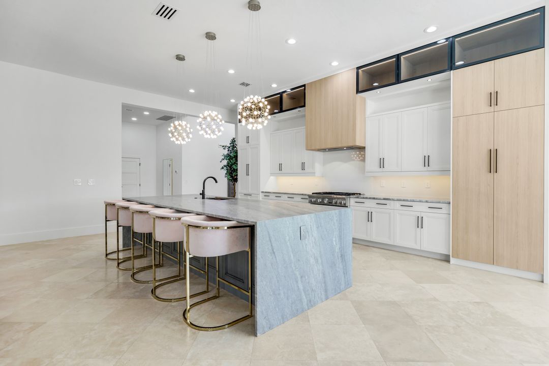 13087 Pond Apple Dr E, Naples, FL 34119