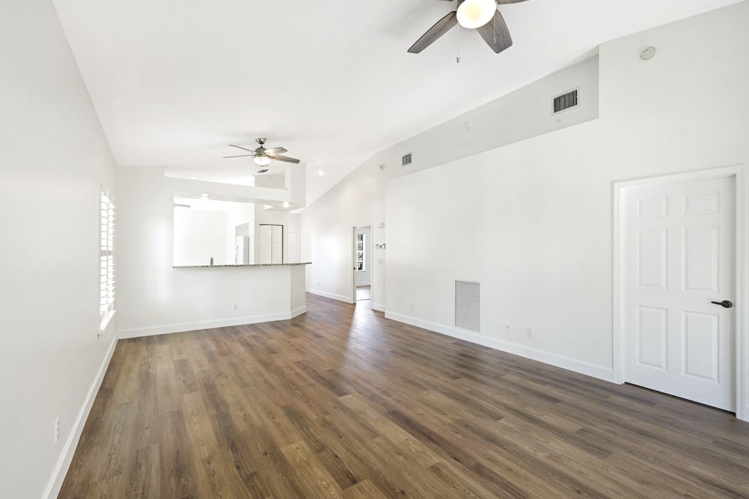 675 Wiggins Lake Dr #202, Naples, FL 34110