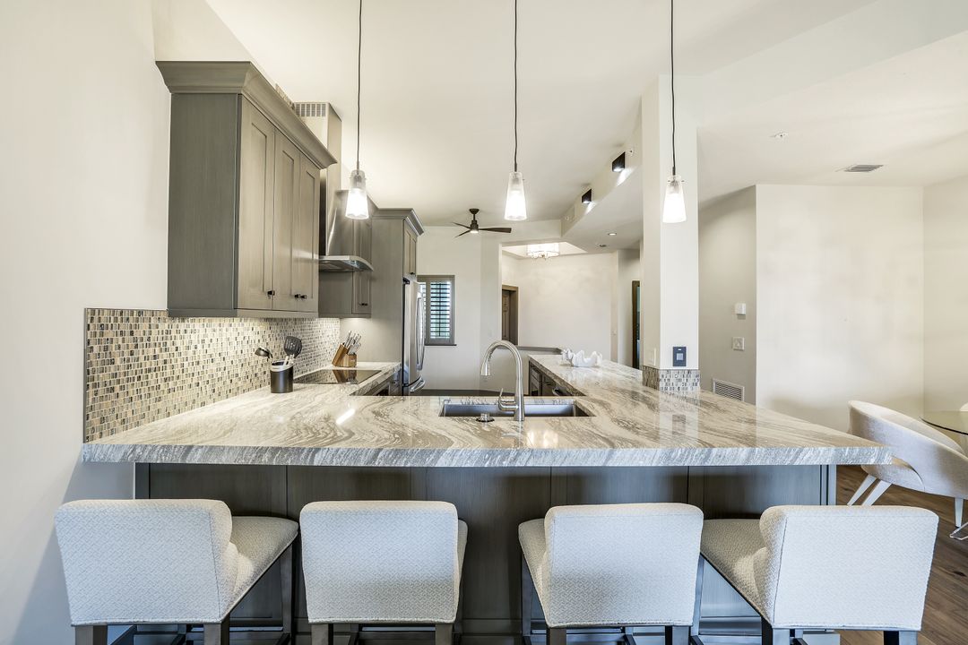 7655 Pebble Creek Cir #404, Naples, FL 34108