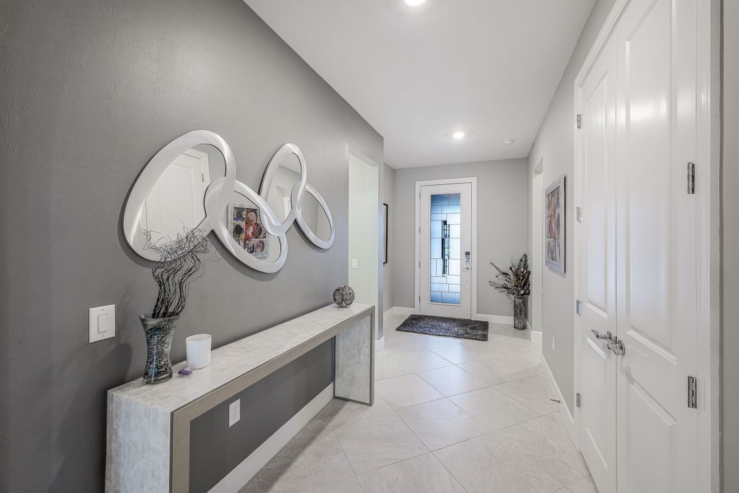 7692 Winding Cypress Dr, Naples, FL 34114
