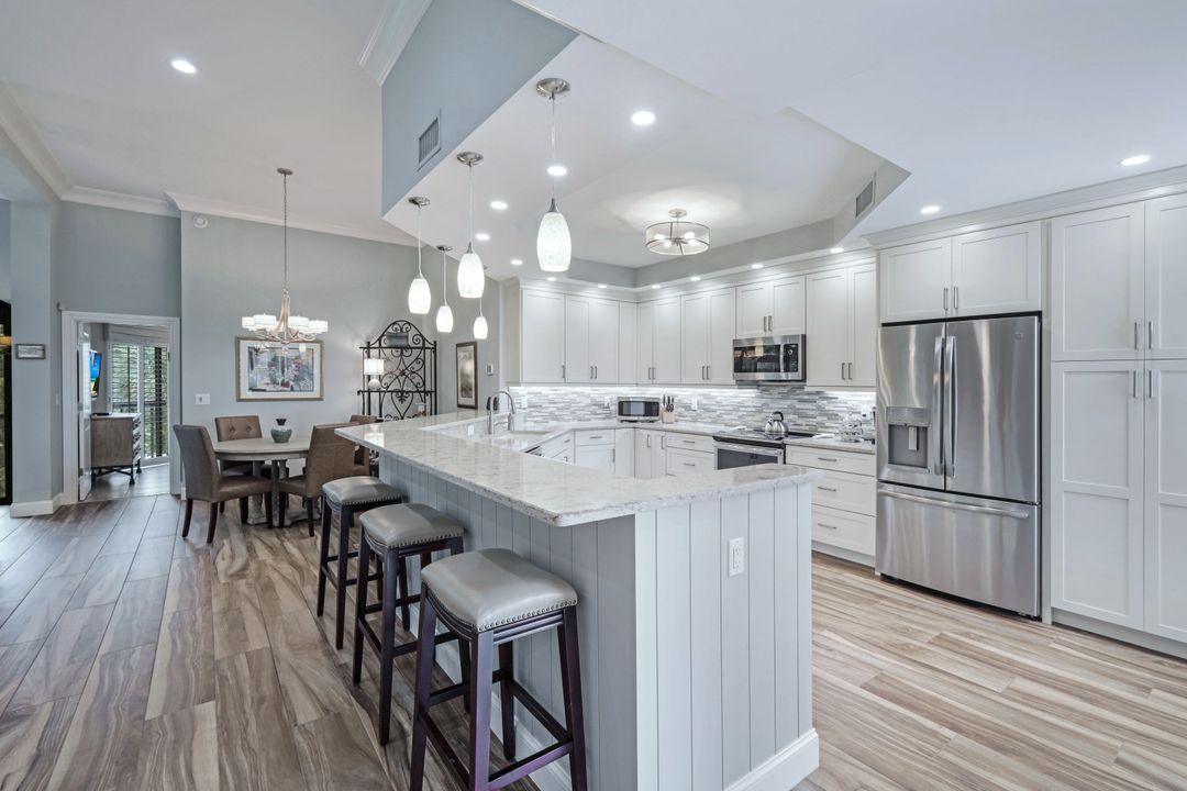 7048 Pelican Bay Blvd #305, Naples, FL 34108