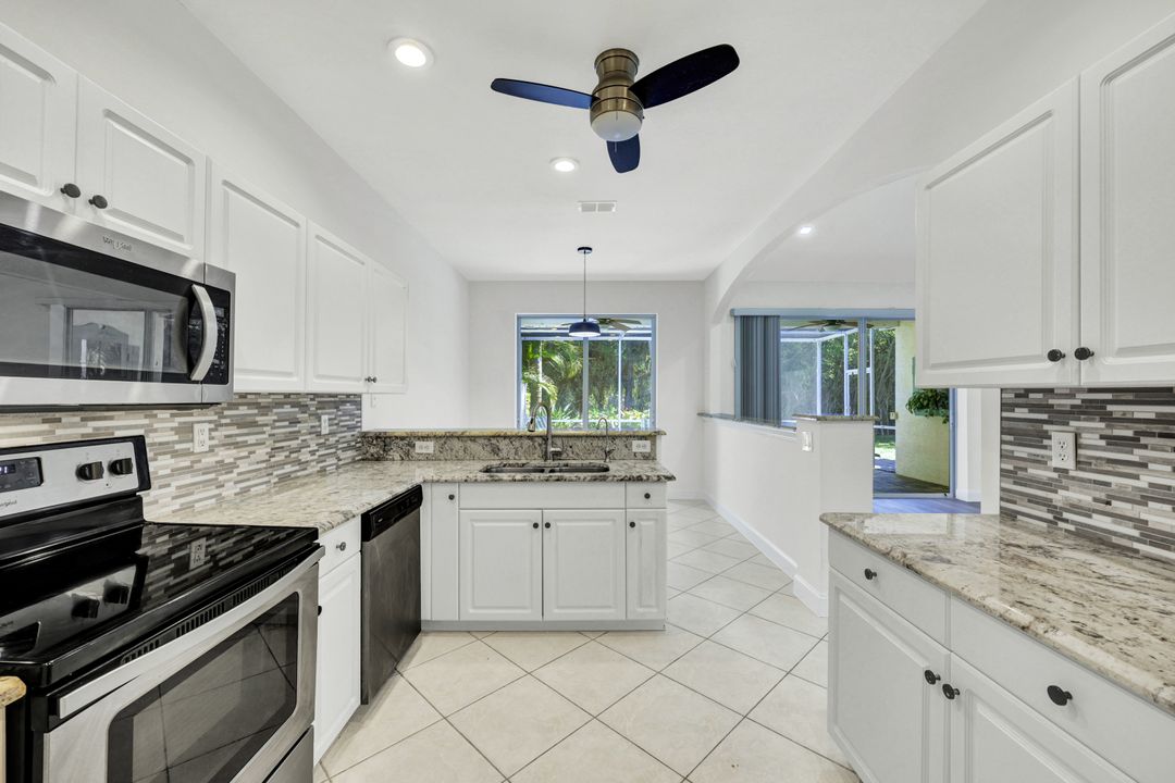 7488 Berkshire Pines Dr, Naples, FL 34104