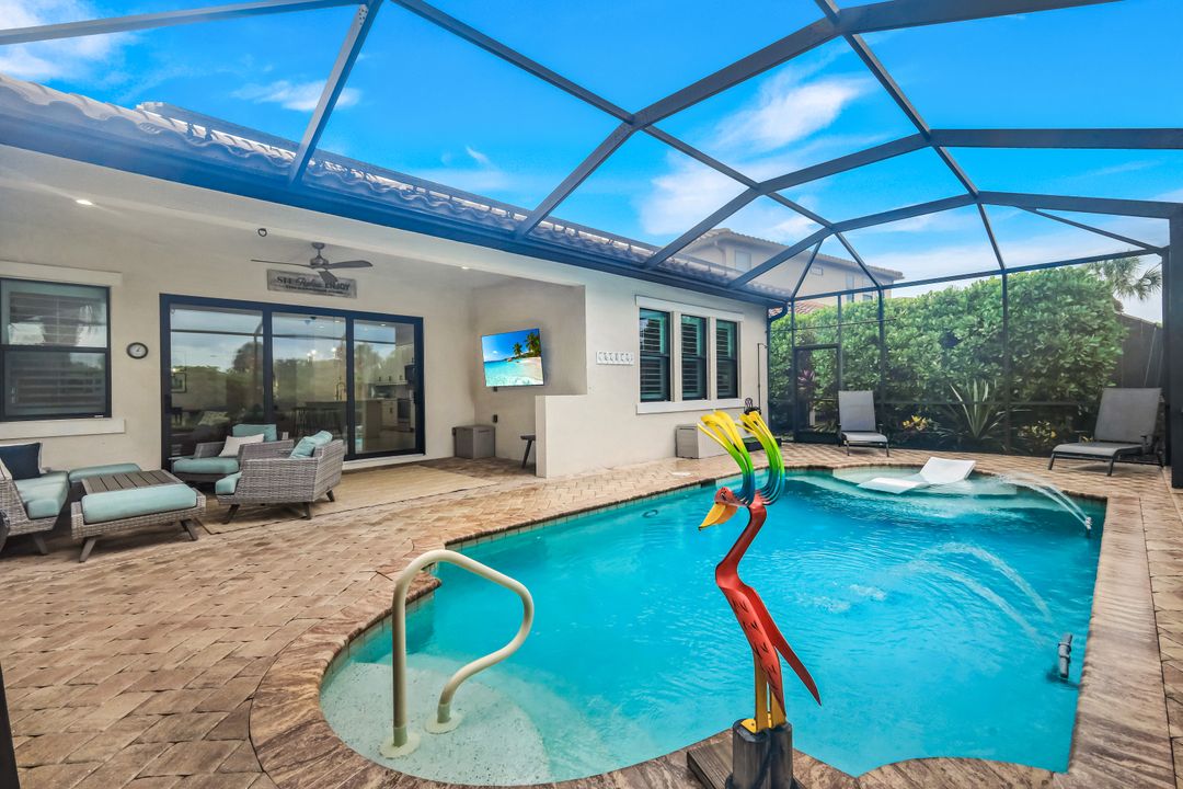 4118 Raffia Dr, Naples, FL 34119