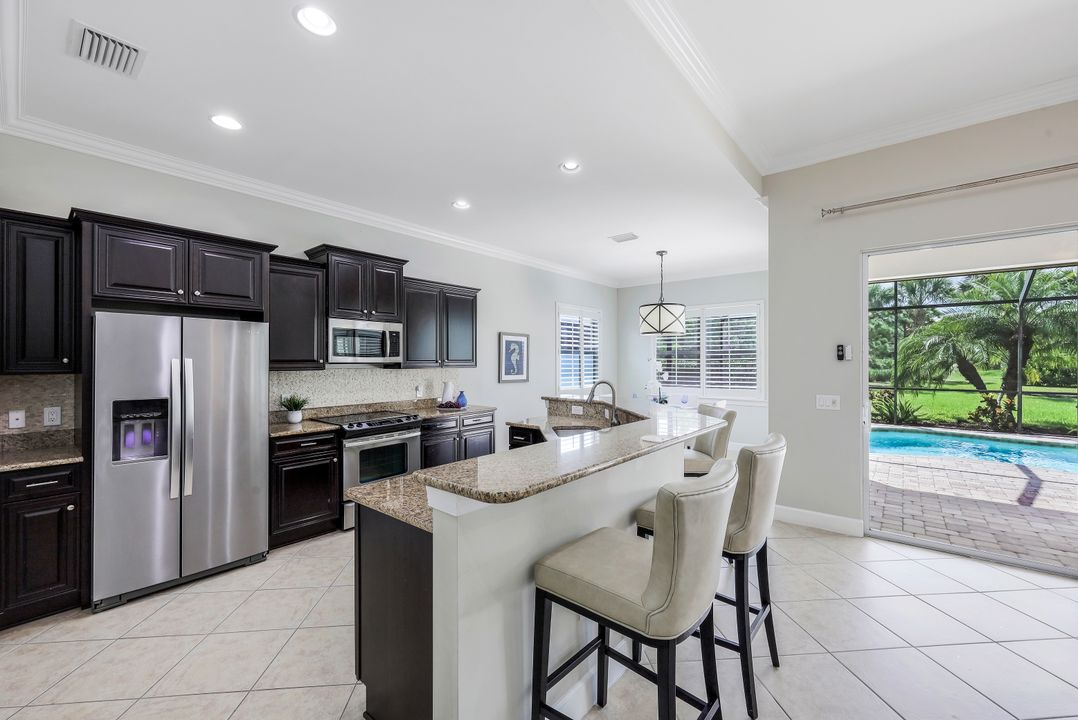 9062 Limestone Ln, Naples, FL 34120