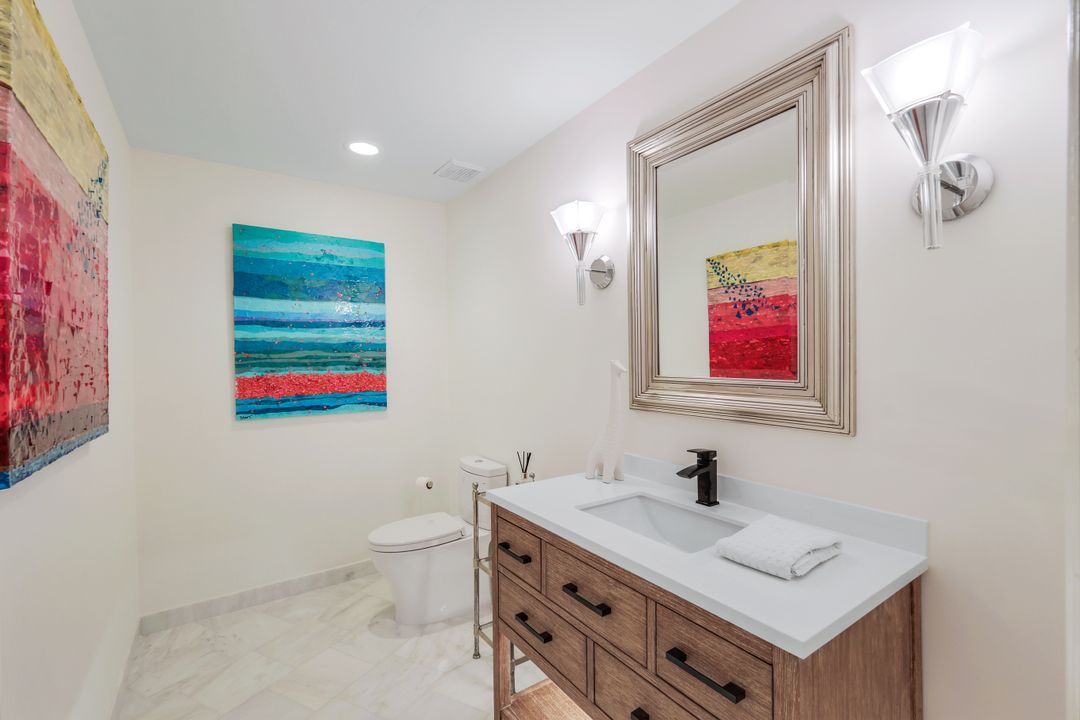 12975 Bald Cypress Ln, Naples, FL 34119