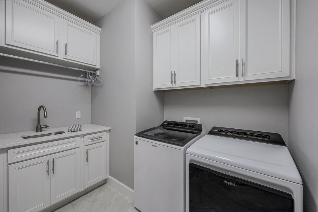 7692 Winding Cypress Dr, Naples, FL 34114