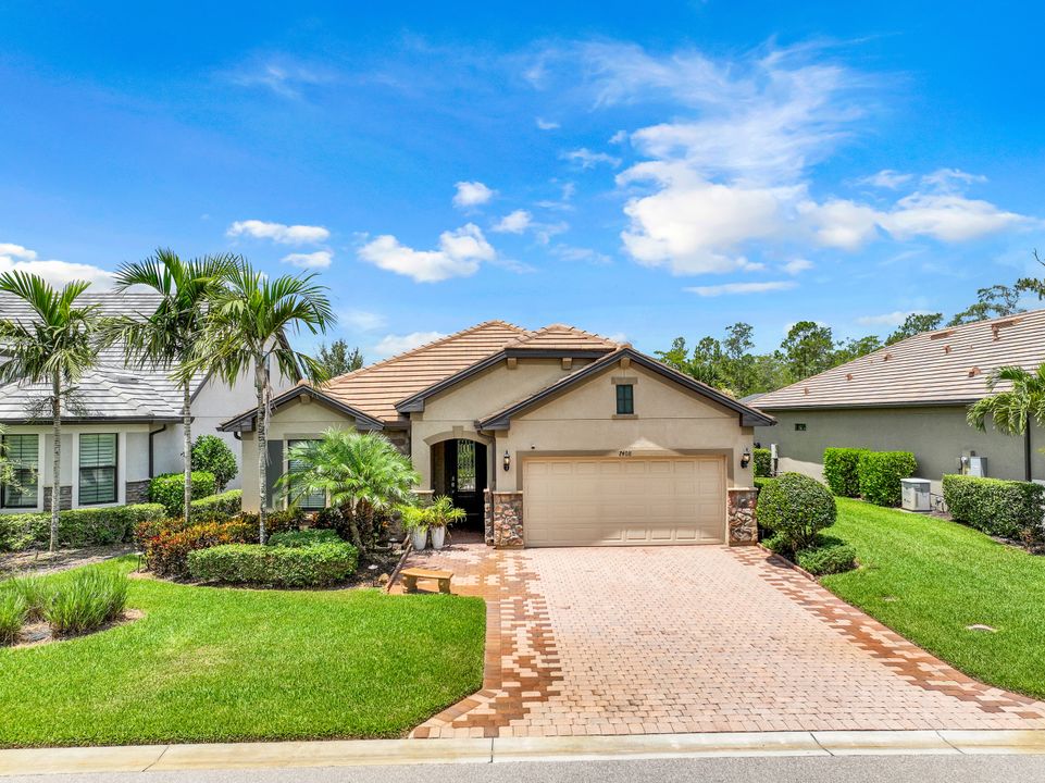 7408 Winding Cypress Dr, Naples, FL 34114