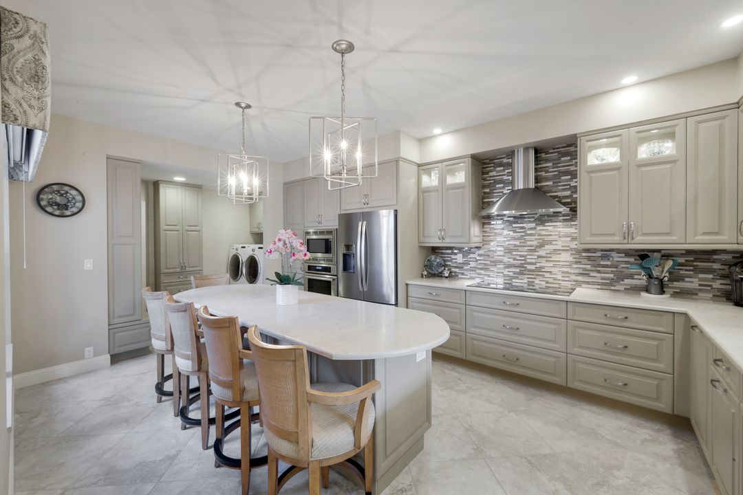 11594 Quail Village Way, Naples, FL 34119