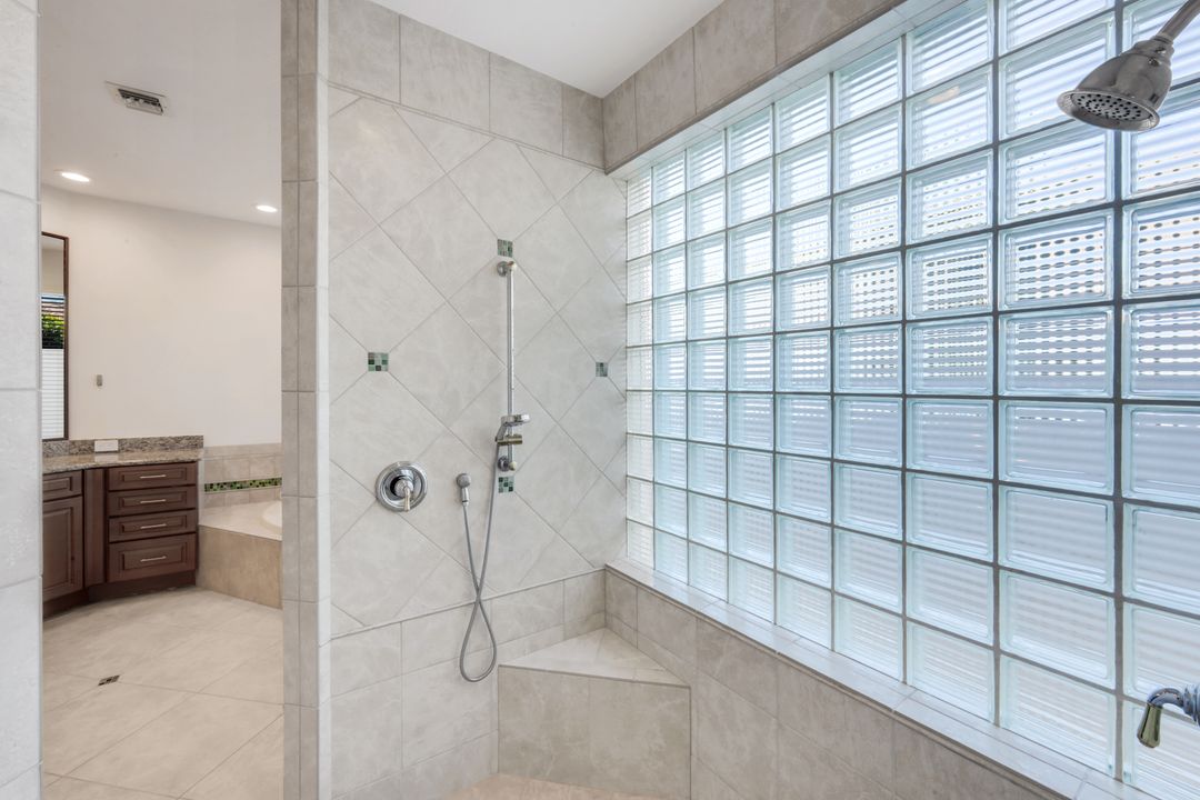 12924 Bald Cypress Ln, Naples, FL 34119