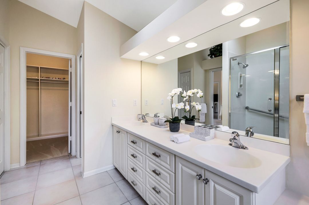 703 Heathery Ln, Naples, FL 34108