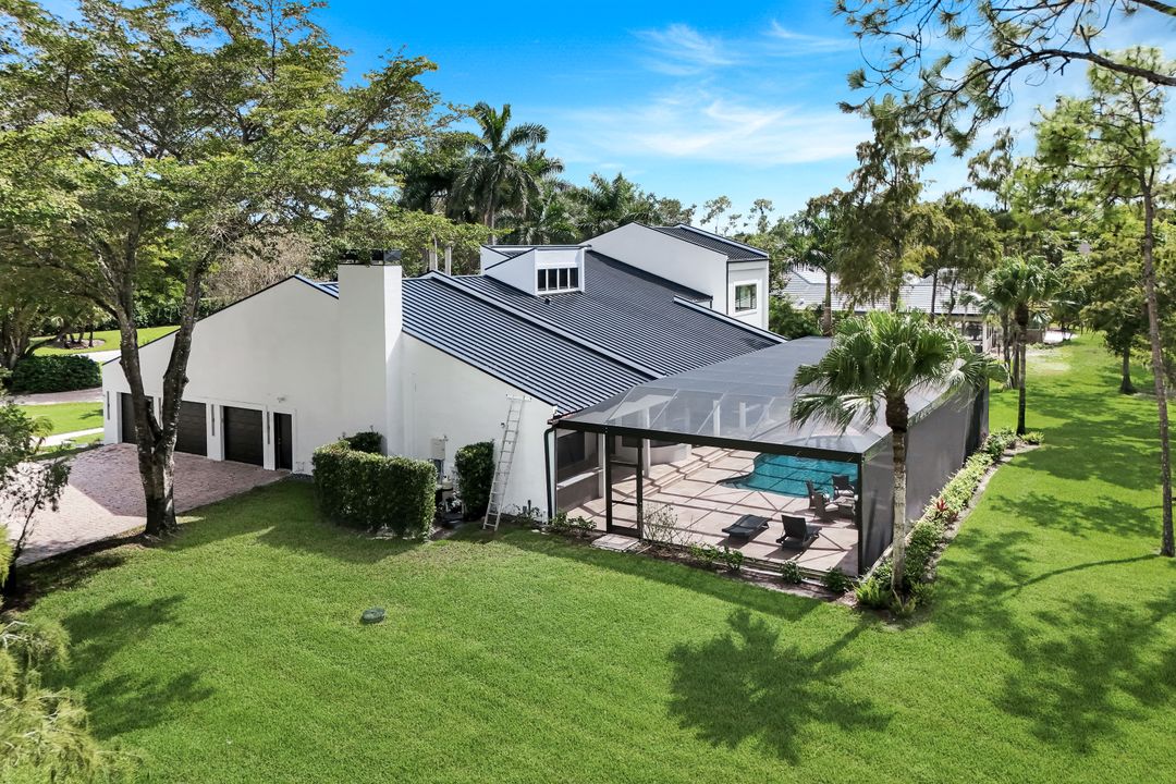 13087 Pond Apple Dr E, Naples, FL 34119