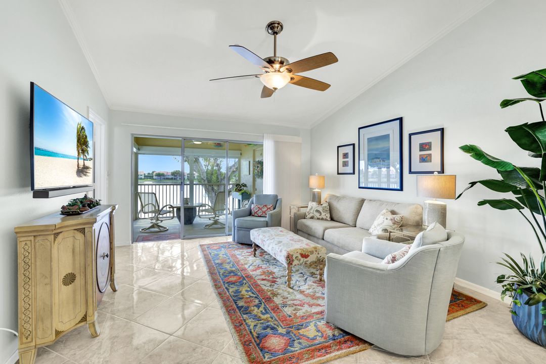 7742 Emerald Cir #V203, Naples, FL 34109