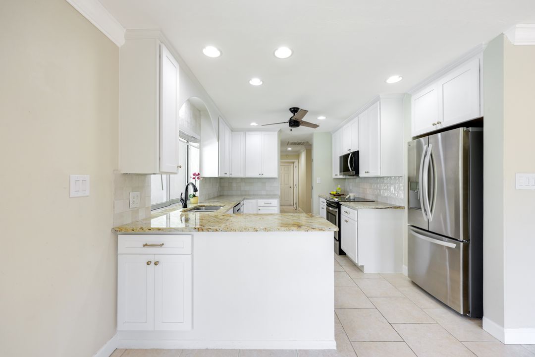 169 Baltusrol Dr, Naples, FL 34113
