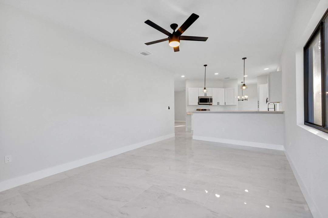 1222 Hilliard St E, Lehigh Acres, FL 33974