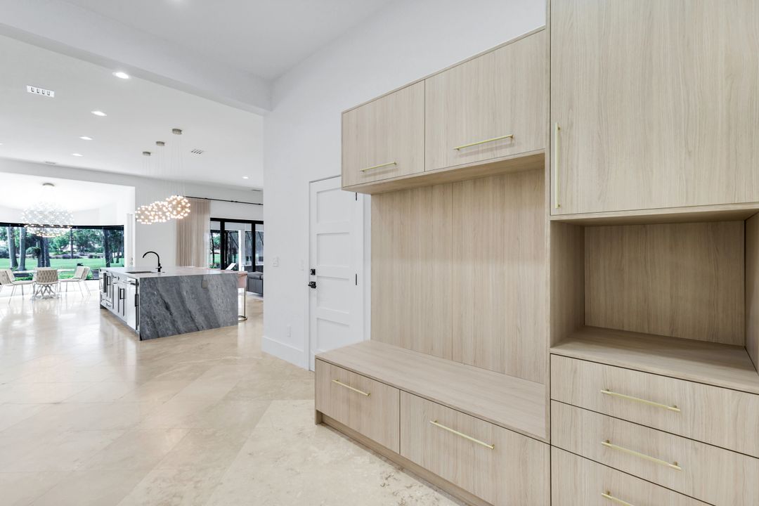 13087 Pond Apple Dr E, Naples, FL 34119